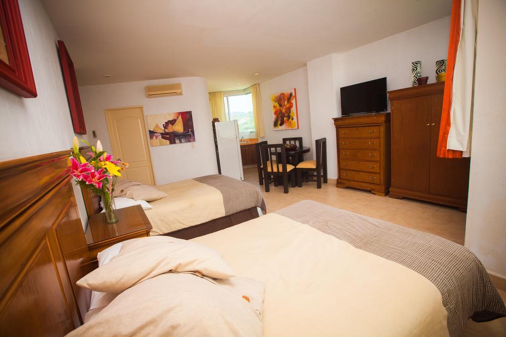 Banderas Suites Бусеріас Номер фото